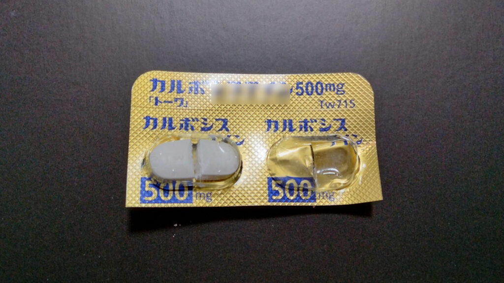 cut packaged tablet (opposite)